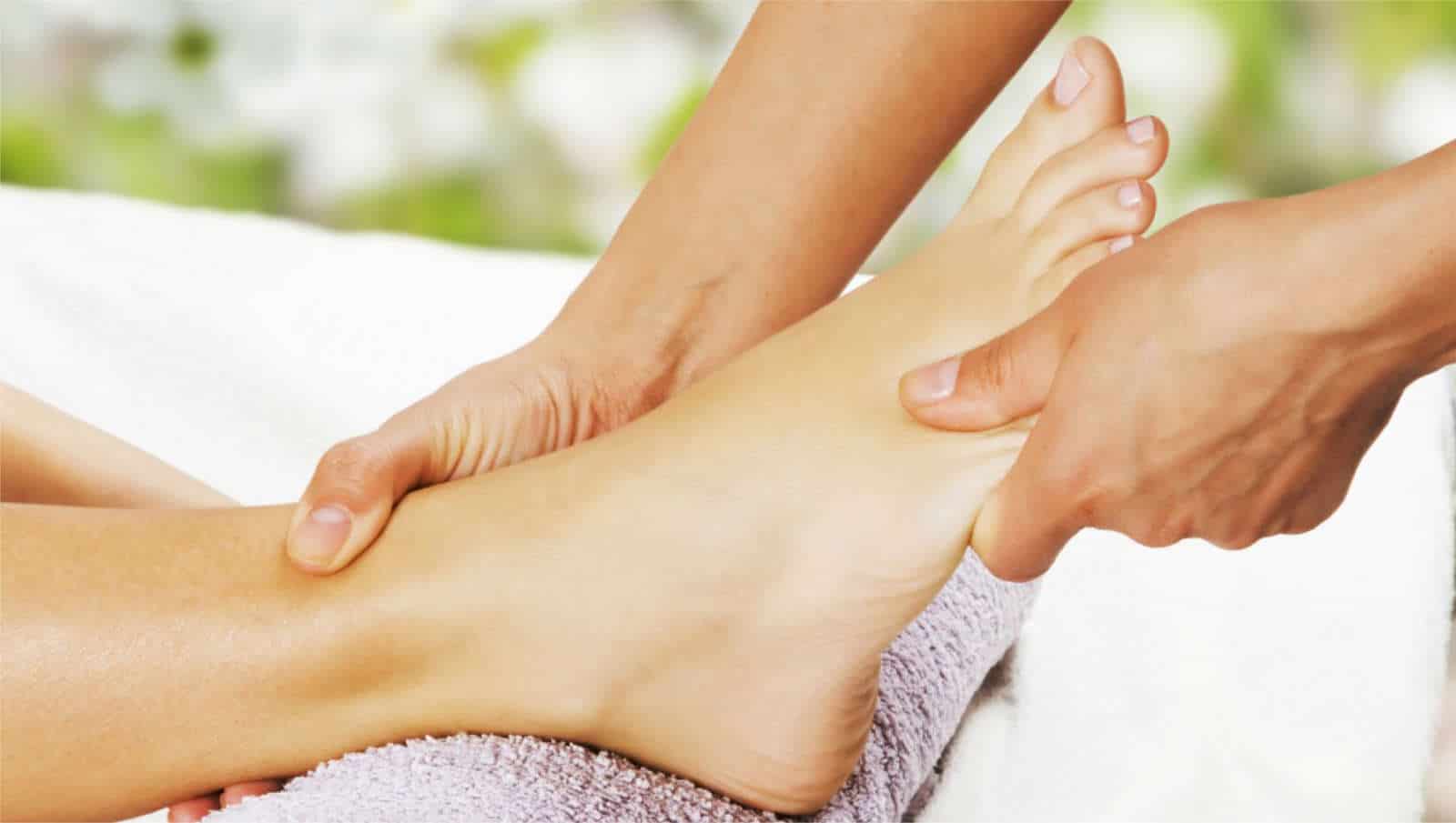 Foot being massaged